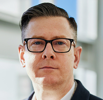 Alexander Hughes, PDG d'une entreprise de trading crypto, en portrait
